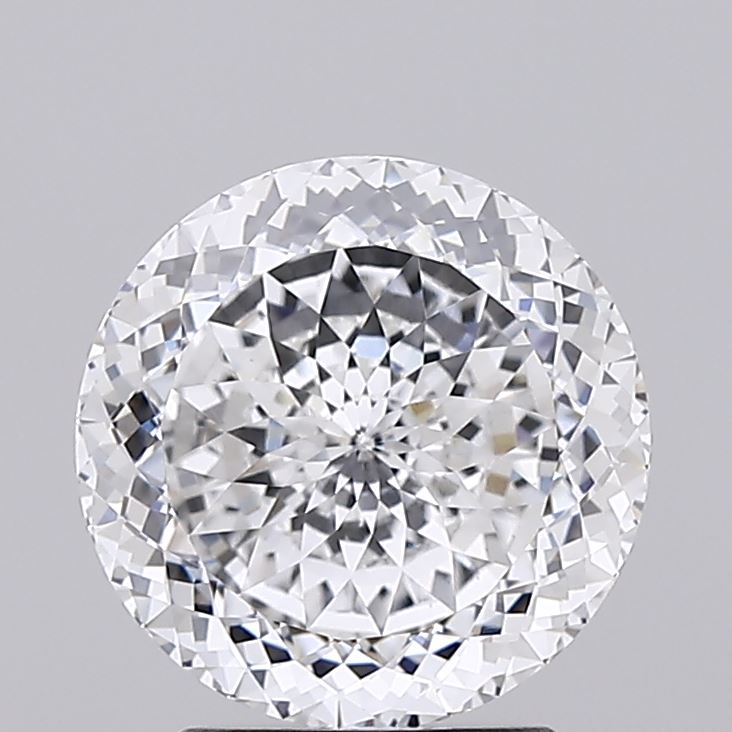 2.54 A brilliant, round-cut diamond with intricate facets reflecting light, placed against a soft gray background.