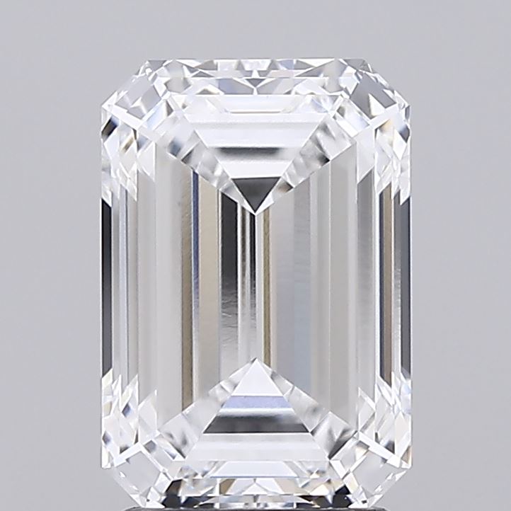 2.54 A brilliantly cut, transparent emerald-shaped diamond with sharp edges and multiple facets reflecting light.