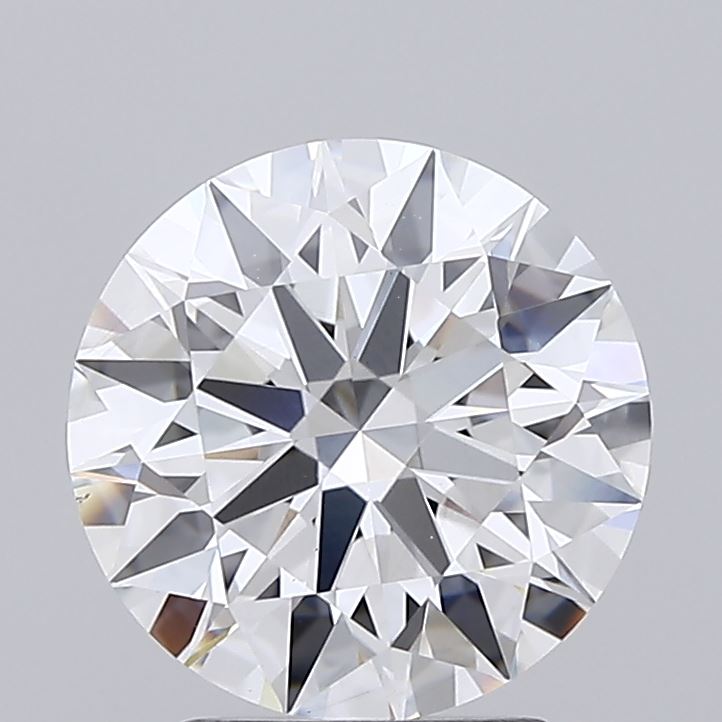 2.56 A round, brilliantly cut diamond is shown against a soft gray background, emphasizing its sparkling facets and clarity, evoking elegance and luxury.