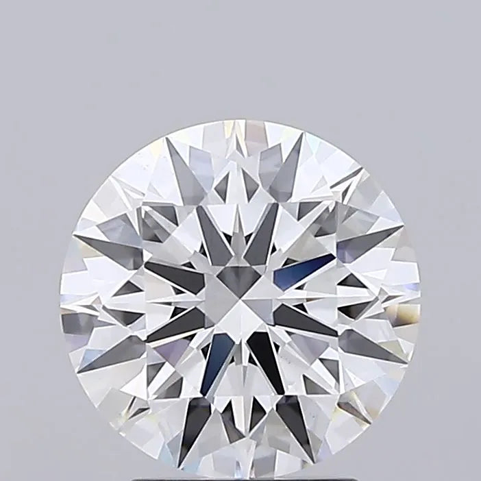 2.57 Round cut diamond with multiple facets on a grey background.