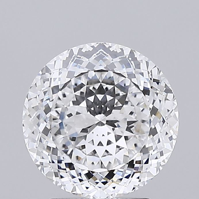 2.58 Close up of a round cut diamond against a grey background.