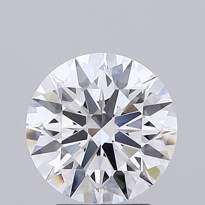 2.58 A sparkling, round-cut diamond with intricate facets reflecting light, set against a plain gray background, conveying elegance and sophistication.