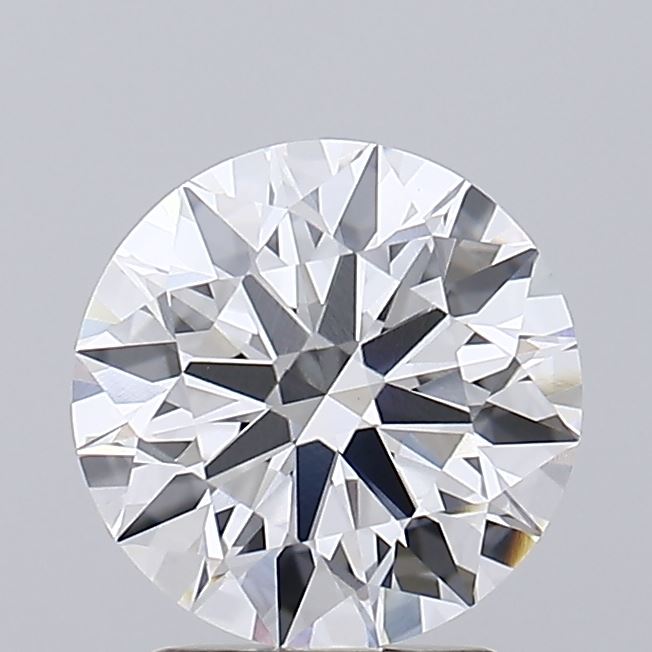 2.59 A close-up image of a brilliant-cut diamond, round in shape, displaying intricate facets reflecting light. The background is a soft gray, highlighting the gem's clarity and sparkle.