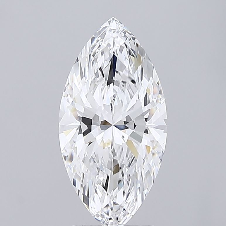 2.59 Marquise-cut diamond with brilliant facets, reflected light, and sharp edges. Its symmetrical shape creates an elegant, sparkling effect on a gray background.