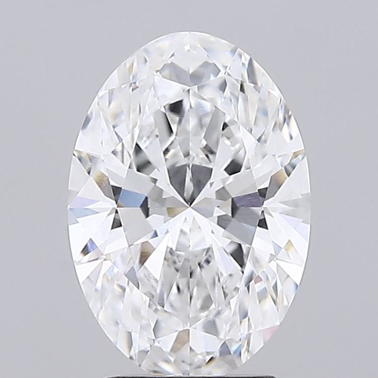 2.59 Oval-cut diamond with brilliant facets, displaying a radiant sparkle on a gray background, conveying elegance and luxury.