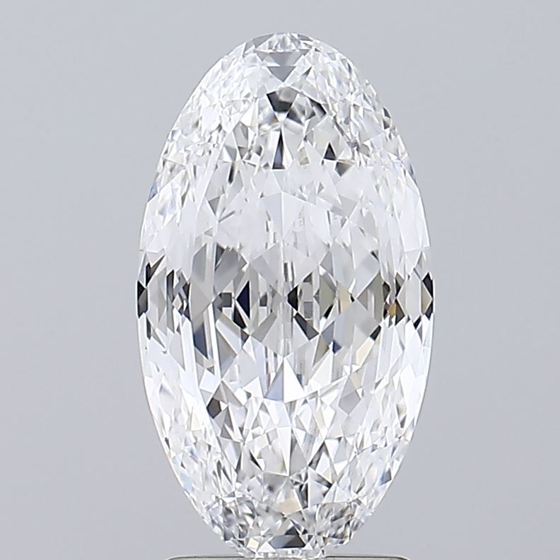 2.59 Oval-shaped diamond with intricate facets, sparkling brightly under light. Set against a plain gray background, it conveys elegance and luxury.