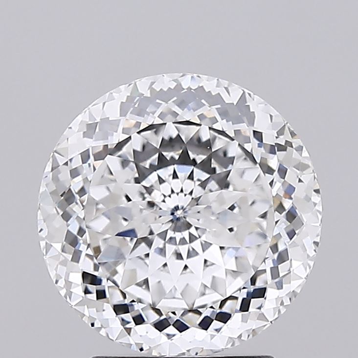 2.59 A round, brilliant-cut diamond sparkles with intricate facets, reflecting light against a soft gray background.