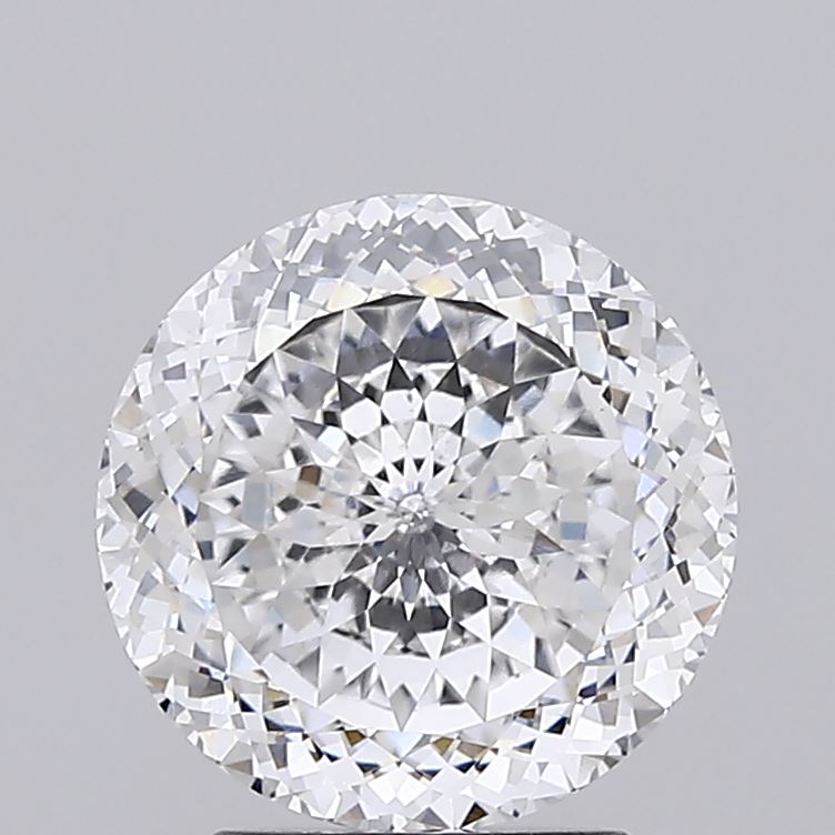 2.59 A close up of a round brilliant cut diamond against a neutral background.