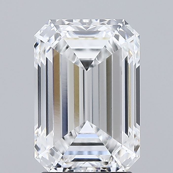 2.59 A stunning, transparent emerald-cut diamond with brilliant facets, reflecting light elegantly against a gray background.