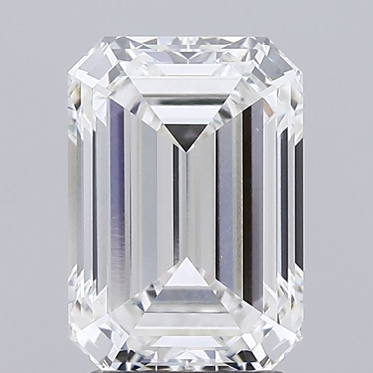 2.7 Emerald-cut diamond with step cuts and triangular facets, exhibiting clarity and brilliance.