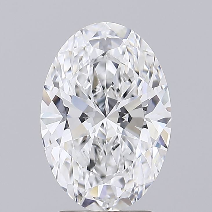 2.70 An oval cut diamond against a grey background showcasing brilliant facets and sparkle.