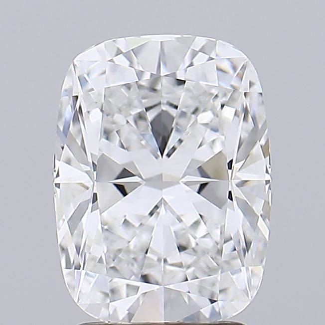 2.72 Cushion-cut diamond on a light gray background, displaying a brilliant sparkle with intricate facets creating a sense of luxury and elegance.