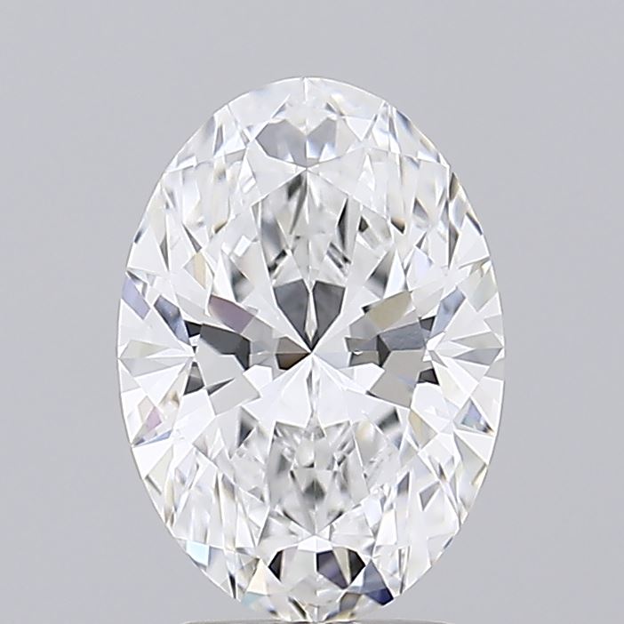 2.73 A brilliant, oval-cut diamond gleams with clarity and facets, reflecting light against a neutral grey background.