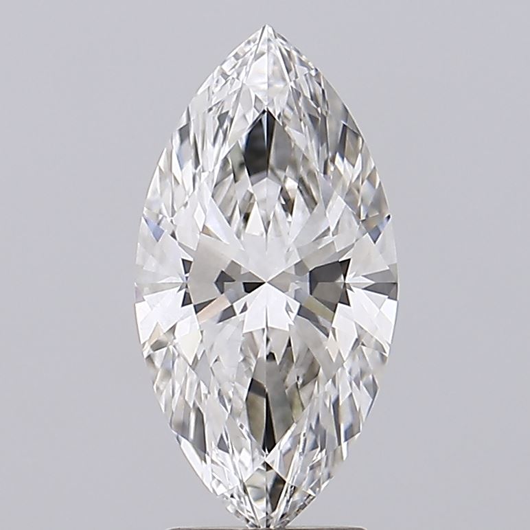 2.73 A marquise-cut diamond with sharp, symmetrical facets shines brilliantly against a soft gray background, reflecting light for an elegant appearance.