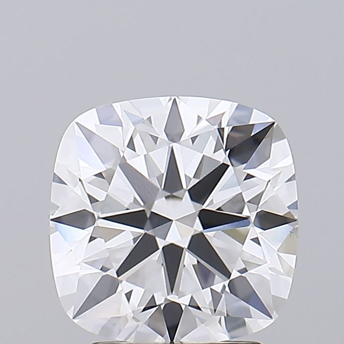 2.77 Close up of a cushion cut diamond against a grey background.