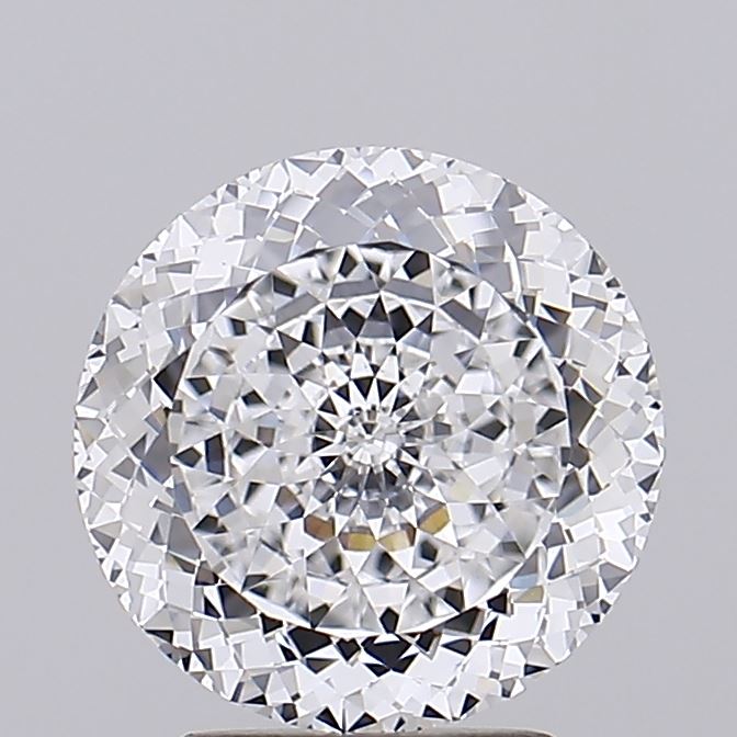 2.77 A round brilliant cut diamond with multiple facets reflecting light.