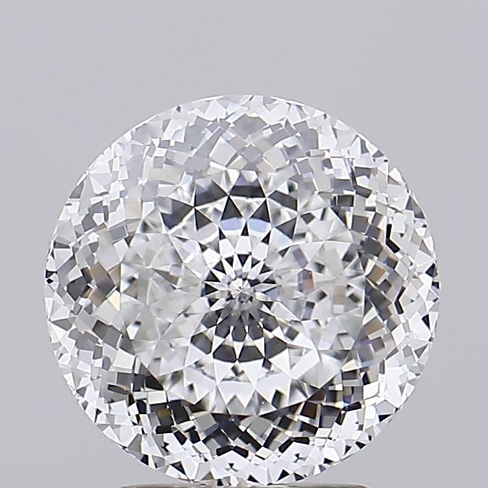 2.82 A sparkling round diamond with intricate facets reflecting light, creating a kaleidoscope effect. The diamond is centered against a soft gray background.