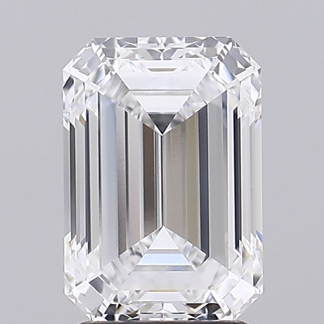 2.9 Emerald-cut diamond with sharp edges and clear facets, set against a plain gray background, highlighting its brilliance and precision.