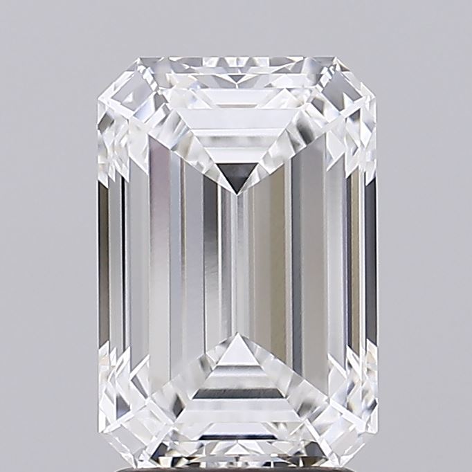 2.92 Close-up of a clear, rectangular emerald-cut diamond, showcasing its intricate facets and brilliance against a soft gray background.