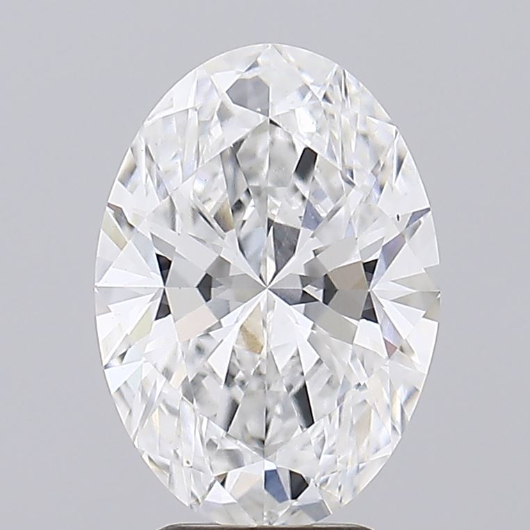 3.01 Oval-cut diamond with multiple facets and a clear, brilliant surface against a grey background.