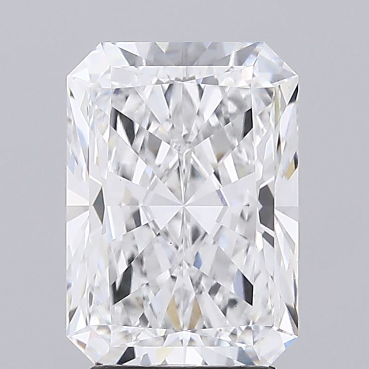 3.04 A closeup of a radiant cut clear diamond against a grey background.