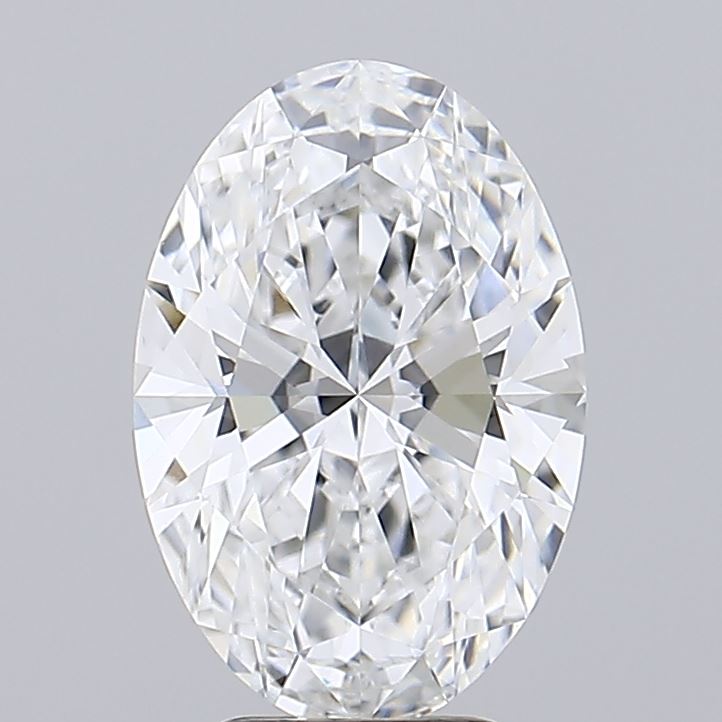 3.06 An oval-cut diamond with brilliant facets, showcasing exceptional clarity and sparkle against a light gray background.