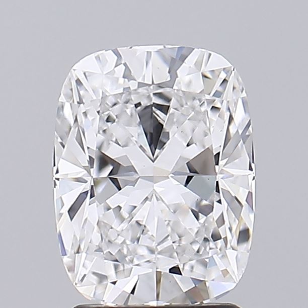 3.07 A cushion-cut diamond on a gray background, showcasing intricate facets and exceptional clarity. The shiny gem exudes elegance and luxury.