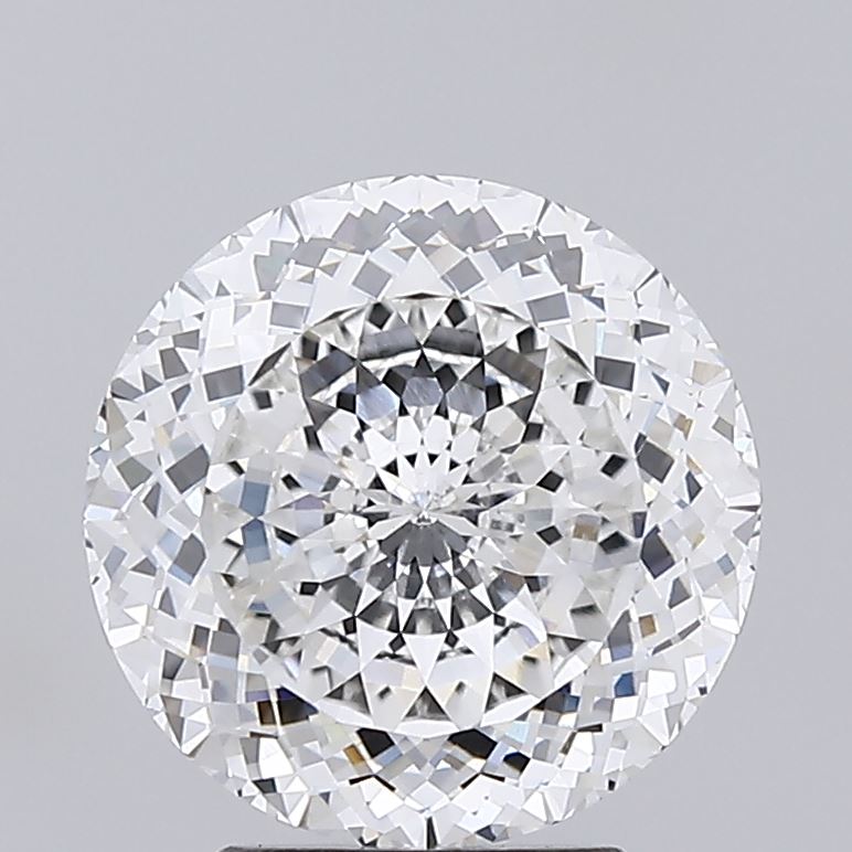 3.09 A round brilliant cut diamond against a light gray background.