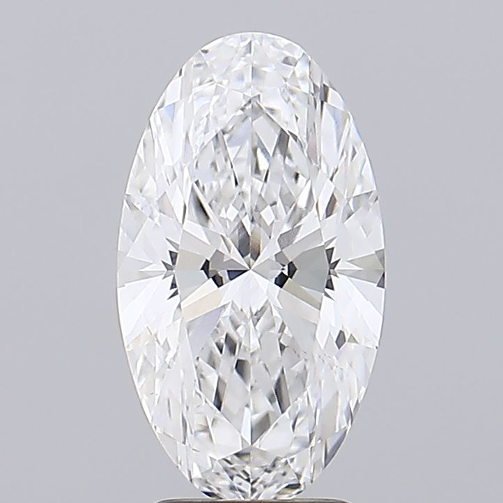 3.26 Close-up of a brilliant oval-cut diamond, showcasing its intricate facets and sparkling clarity against a neutral background.
