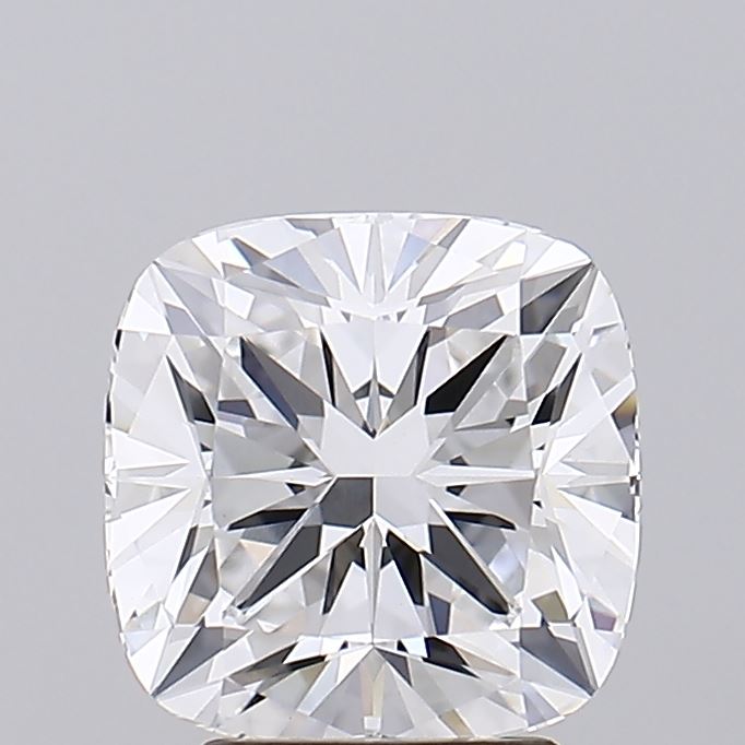 3.26 Close-up of a cushion-cut diamond against a gray background.