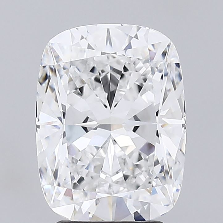 3.27 Close-up of a long cushion cut diamond against a grey background.