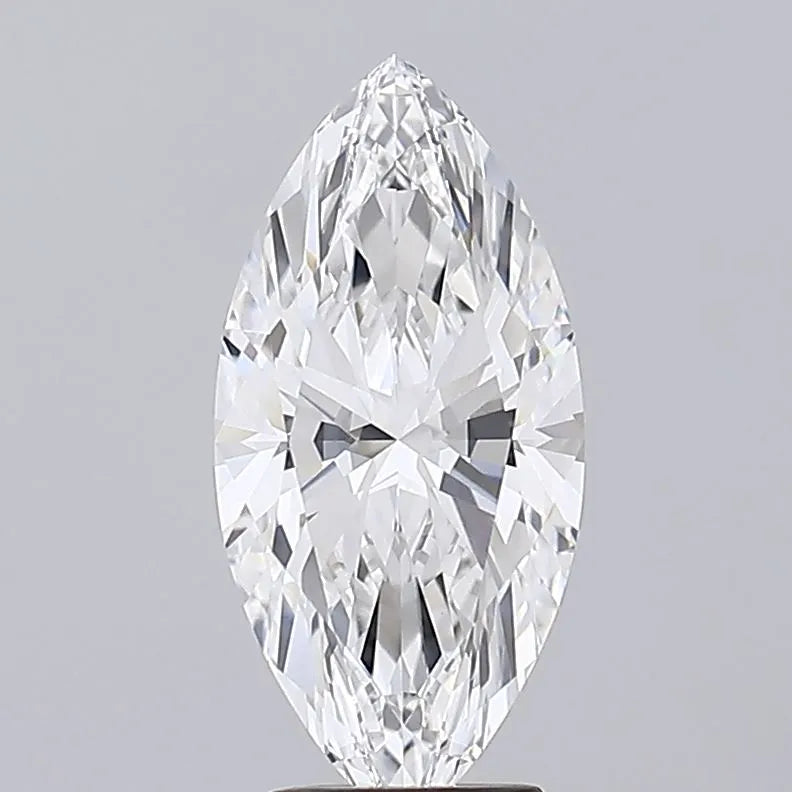 3.42 A sparkling marquise cut diamond with multiple facets against a gray background.