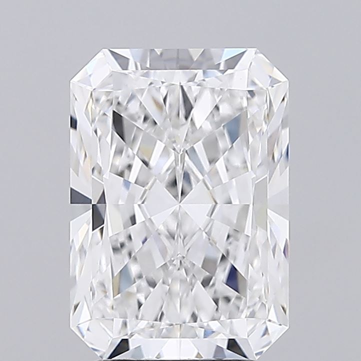 Close-up of a radiant cut diamond against a gray background.