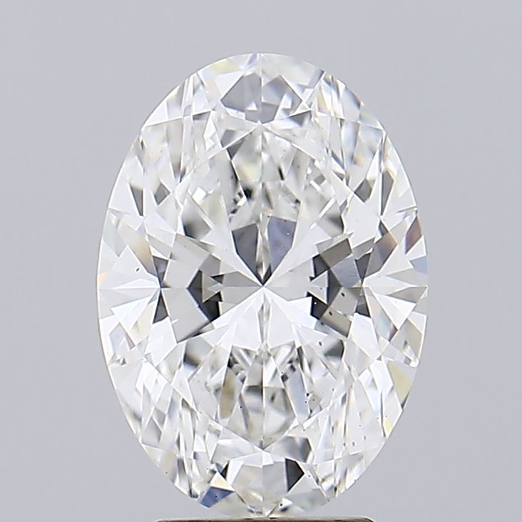 3.53 Oval cut diamond with multiple facets reflecting light on a gray background.