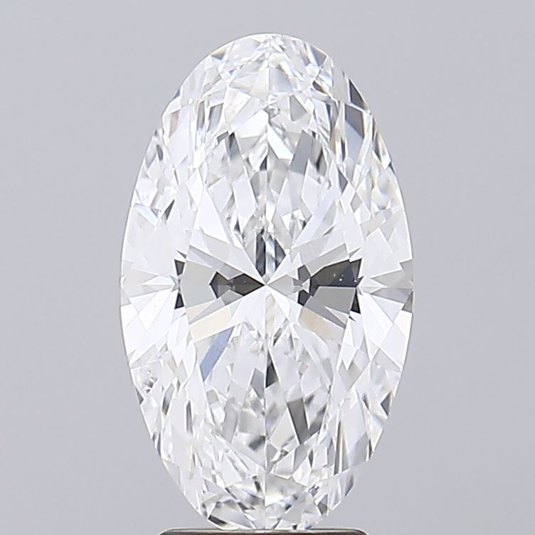 3.55 Oval-shaped diamond with intricate facets, reflecting light brilliantly, set against a soft gray background. It conveys elegance and luxury.