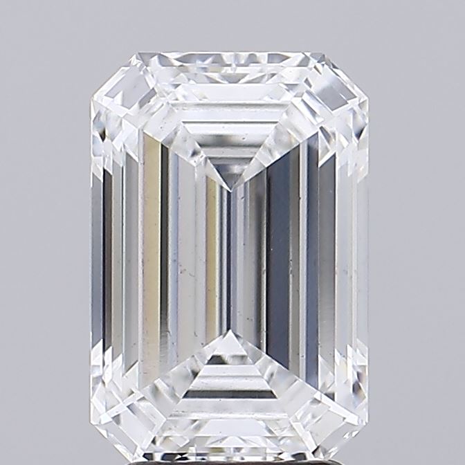3.56 A clear, emerald-cut diamond with sharp, angular facets reflecting light, set against a plain gray background, creating a luxurious and elegant tone.