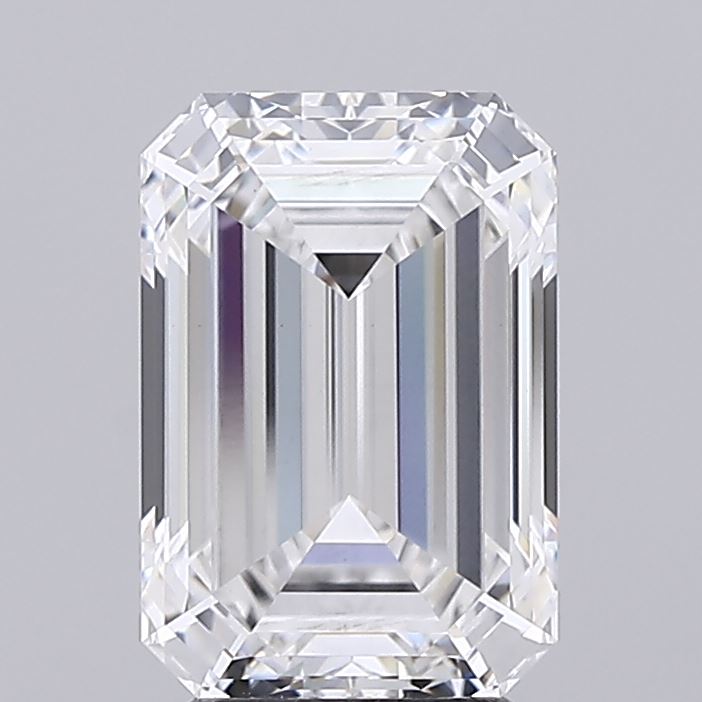 3.57 A stunning, clear emerald-cut diamond with intricate facets, reflecting light and showcasing brilliance against a gray backdrop.
