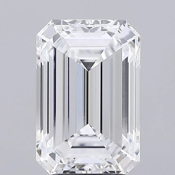 3.59 A clear emerald cut diamond against a grey background.