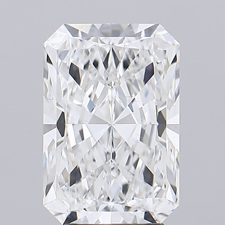 3.59 Close-up of a brilliantly cut, rectangular diamond showcasing its clarity and sparkling facets against a soft gray background.