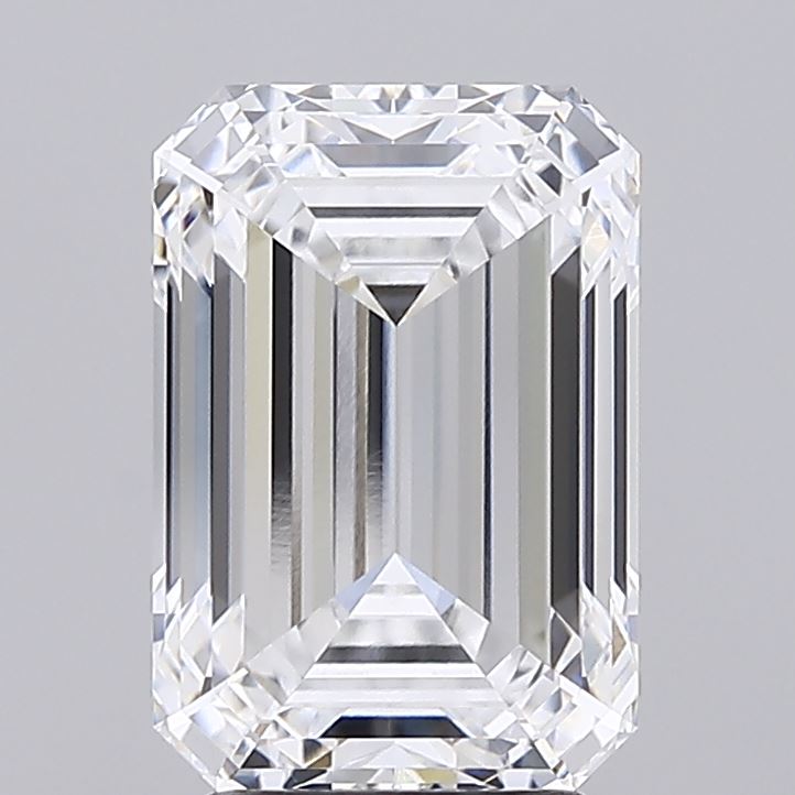 3.71 Emerald-cut diamond displaying clarity and precision with symmetrical facets and sharp edges, reflecting light brilliantly against a gray background.