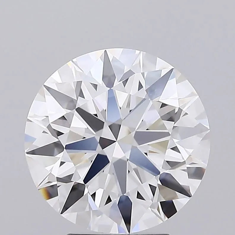 3.87 Round cut diamond showcasing its facets against a gray background.