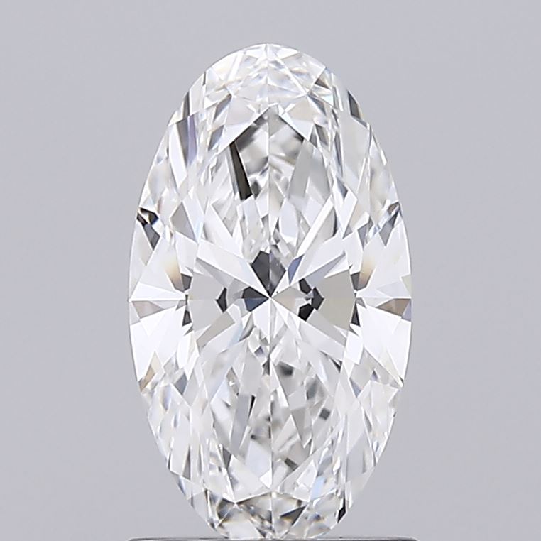3.94 Oval-shaped diamond on a gray background, showcasing brilliant facets and exceptional clarity, reflecting light in a captivating, luxurious manner.