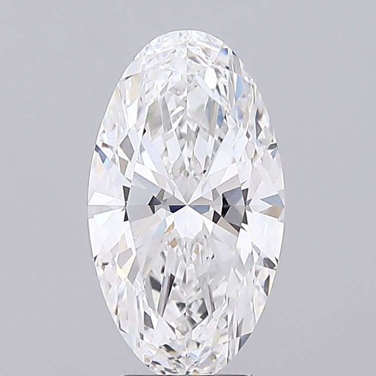3.94 Oval-shaped diamond with intricate facets reflecting light, set against a plain gray background, radiating elegance and brilliance.