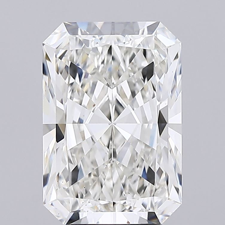 4.06 Radiant-cut diamond on a light gray background, showcasing its rectangular shape with cropped corners. The facets create a sparkling, intricate pattern.