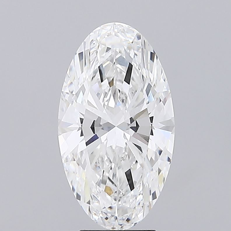 4.28 An oval cut diamond against a gray background showcasing brilliant facets.