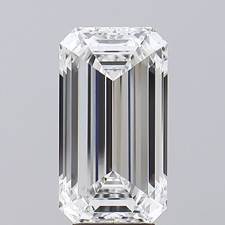 4.35 A sparkling, rectangular-cut diamond with multiple facets reflecting light, showcasing its clarity and brilliance against a neutral background.