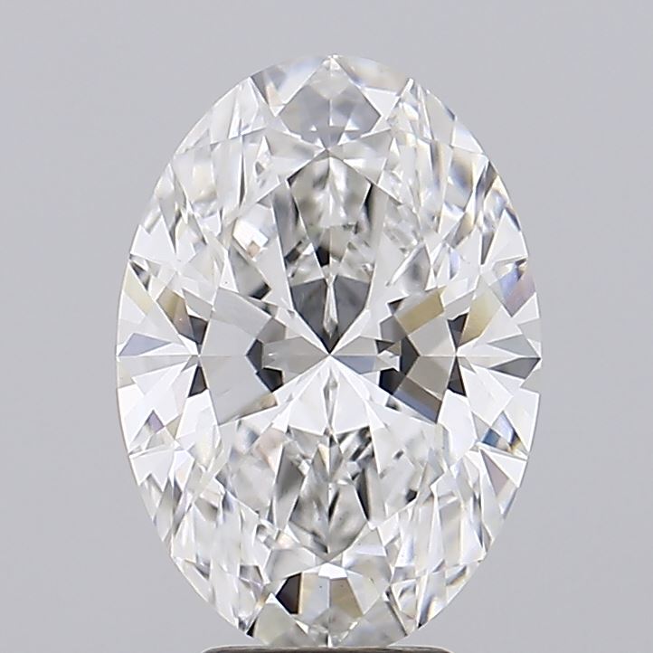 5.08 A sparkling, oval-cut diamond with brilliant facets, reflecting light beautifully against a neutral background.