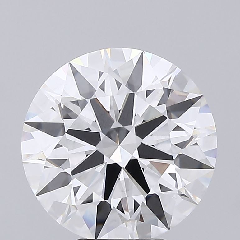 6.07 Close-up of a sparkly, round-cut diamond with intricate facets, reflecting light. The background is a soft, neutral gray, highlighting the gem's clarity.