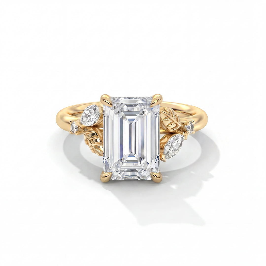 Blossom Setting in 14K Yellow Gold with emerald-cut center stone and sculpted leaf accents