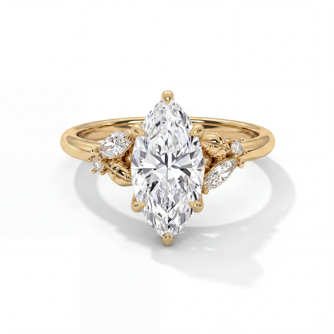 Blossom Setting in 14K Yellow Gold with marquise-cut center stone and sculpted leaf accents